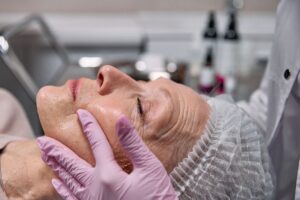 Mature women receiving a skincare treatment for ageing skin